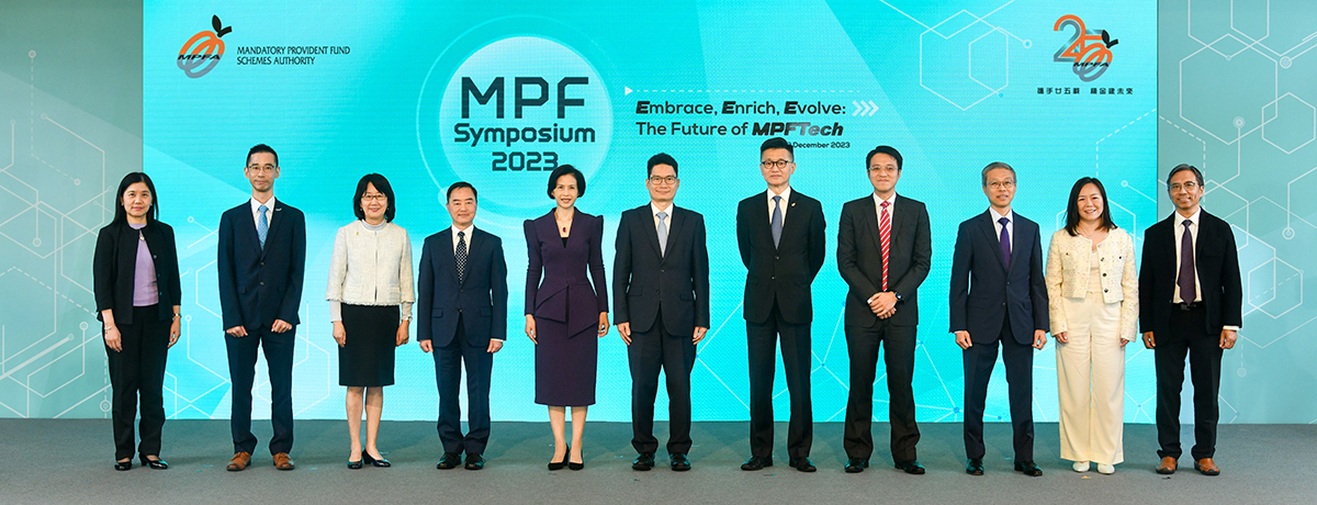 Hon Joseph Chan, Acting Secretary for Financial Services and the Treasury (middle), Ir Tony Wong, Government Chief Information Officer (4th left), Mrs Ayesha Macpherson Lau, Chairman, MPFA (5th left), Ms Ada Chung, Privacy Commissioner for Personal Data (3rd left), Mr Cheng Yan-chee, Managing Director, MPFA (5th right), Ir Alex Chan, General Manager, Digital Transformation Division, Hong Kong Productivity Council (2nd left) in a group photo at the “MPF Symposium 2023”.